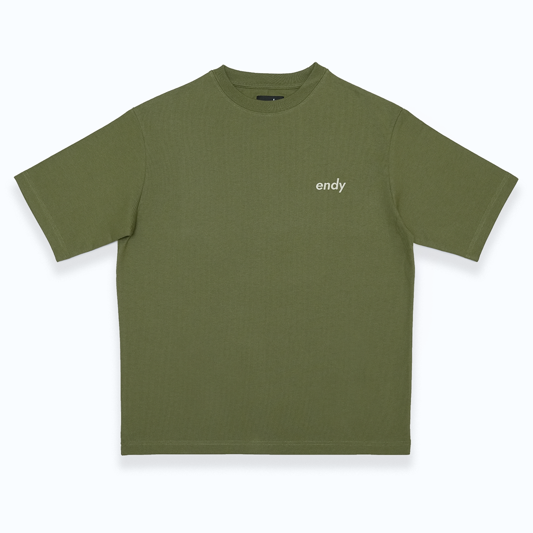 Boxy green t-shirt with a box print on the front