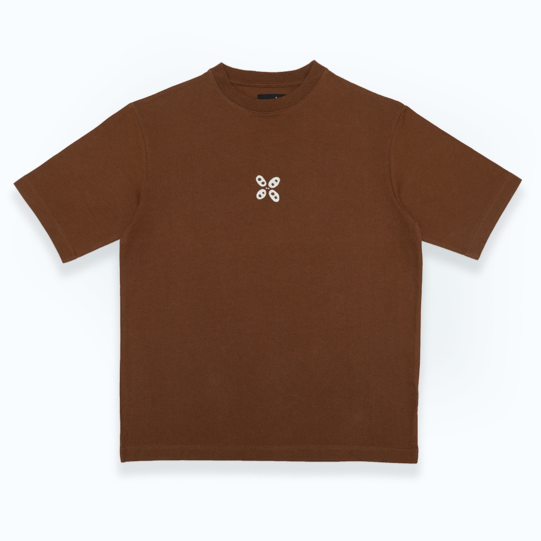 the brown lily graphic t-shirt with a embroidered logo on the front.
