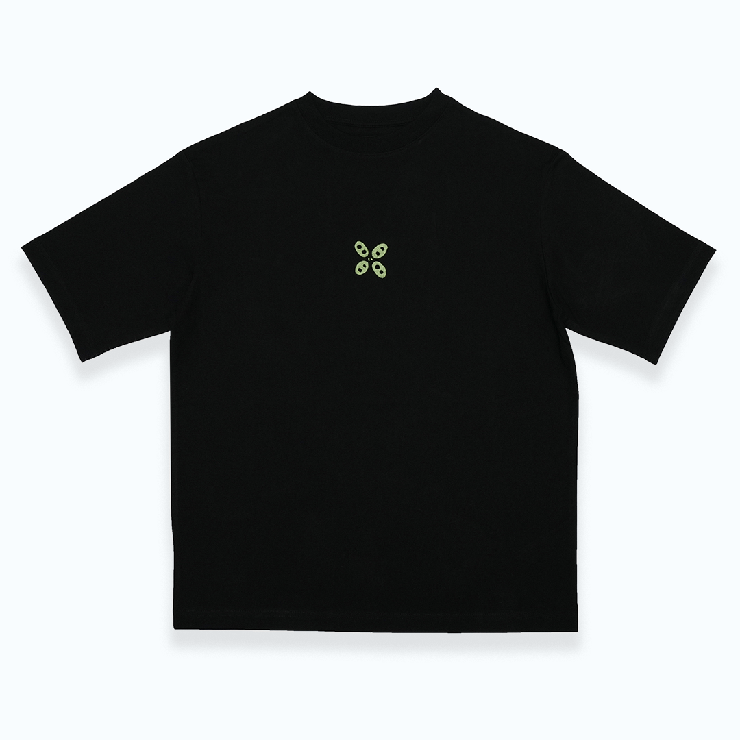 The vase front, a boxy black tee w/ embroidered green logo
